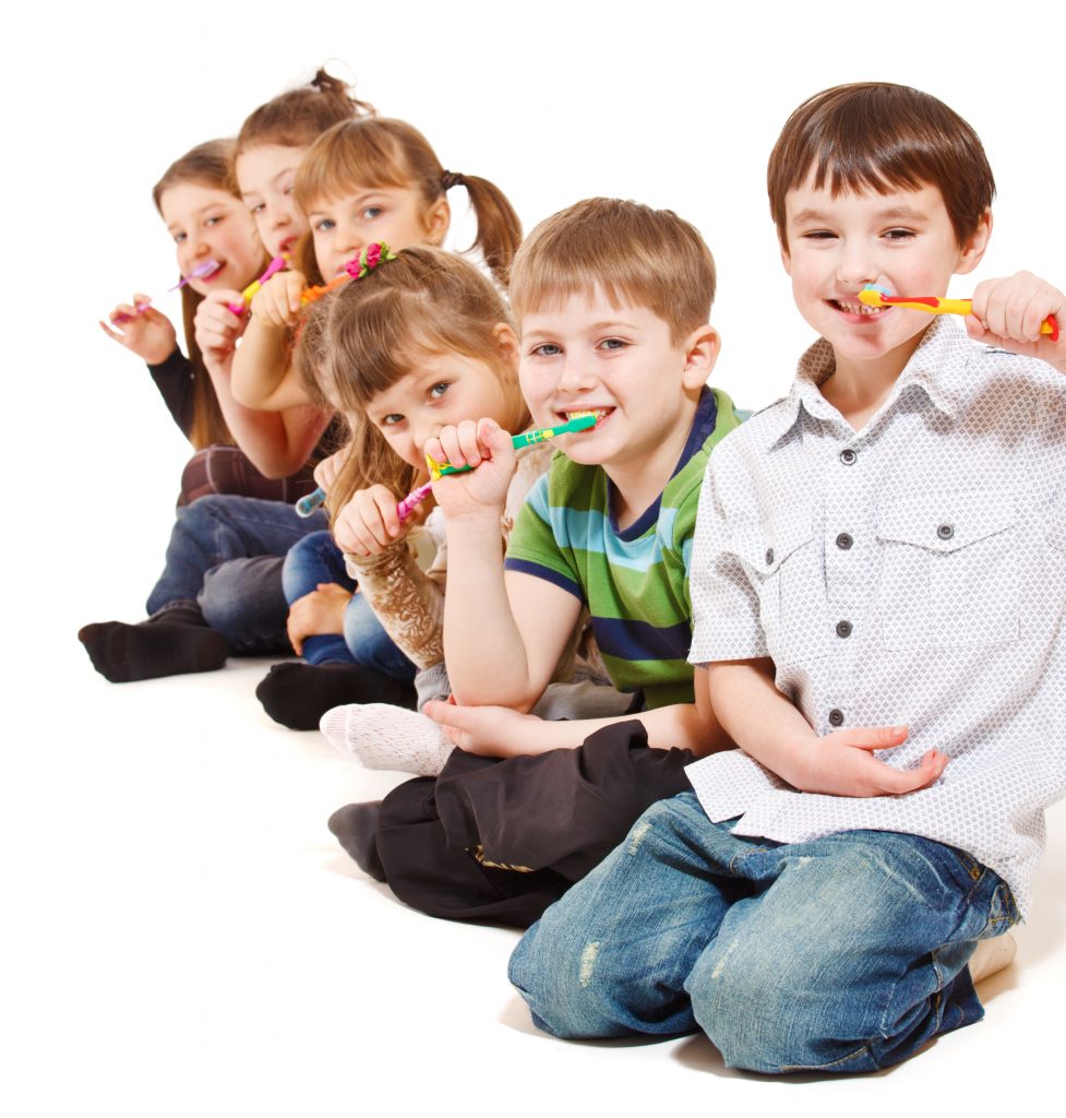 Kids brushing their teeth